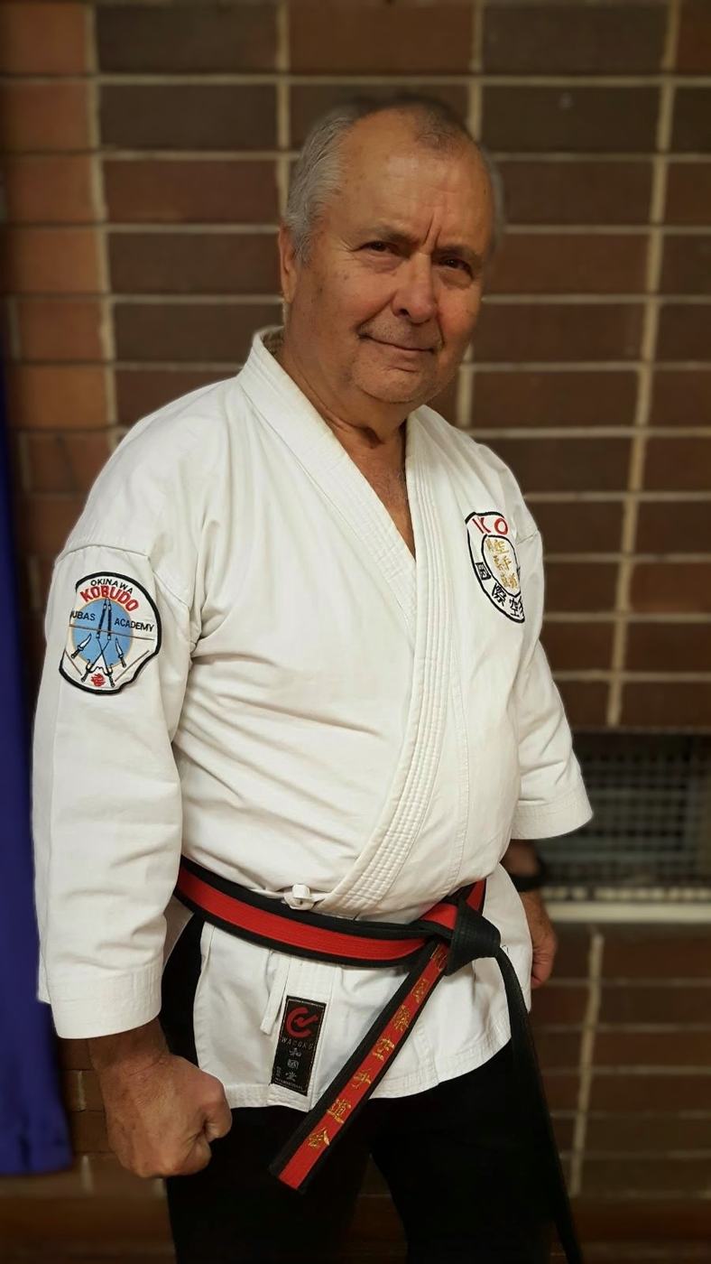 Shihan Andrew Roubas, founder of Roubas Goju Ryu Karatedo Academy, in gi and red-and-black belt