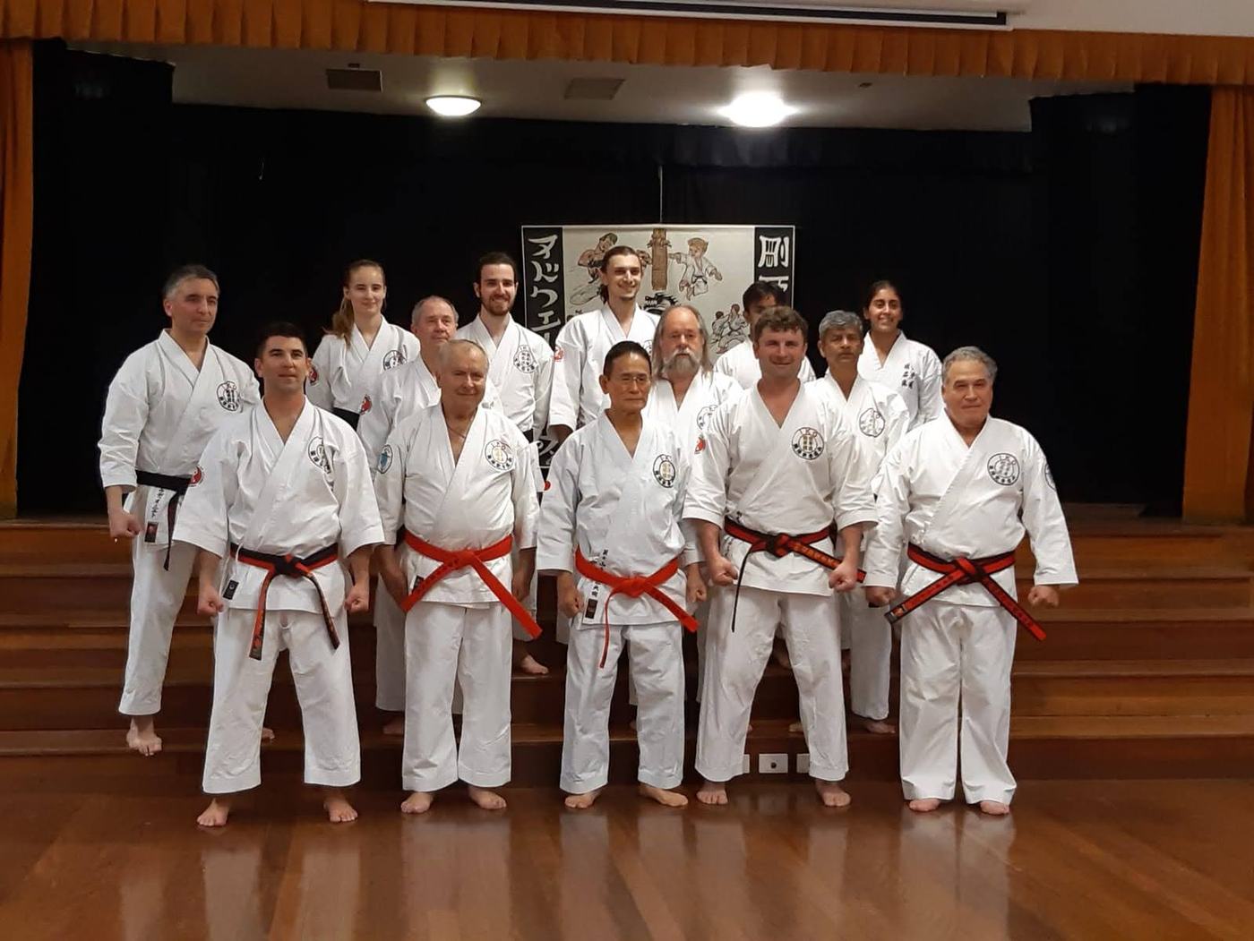 Yamamoto Soshihan with the dojo's black belts during his 2019 visit