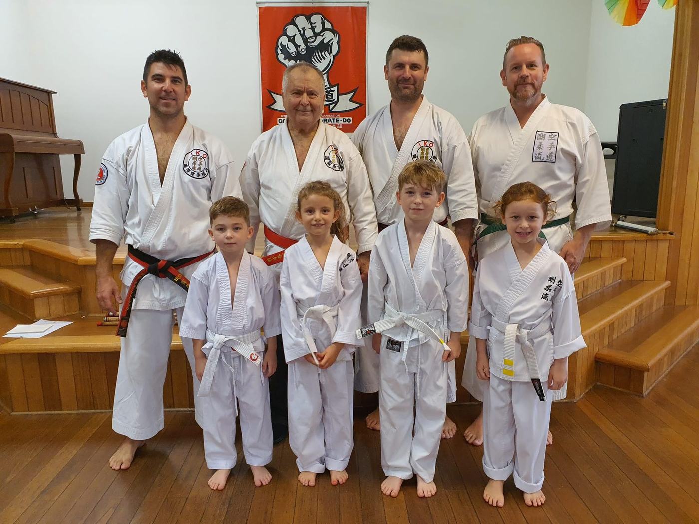 The start of the dojo's third generation — a new young student with family, 2022